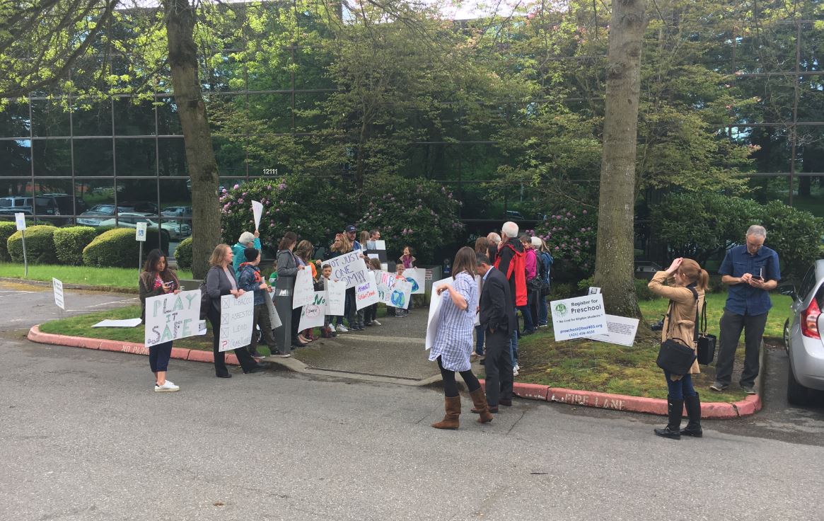 Parents chanted "No crumb rubber, keep our children safe" before the start of the Bellevue School Board meeting #komonews