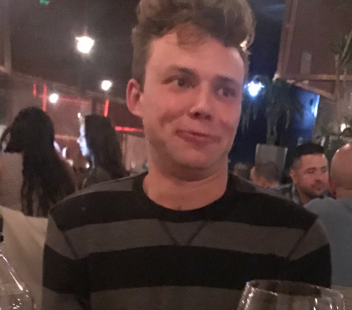 Ashton5SOS's tweet photo. Here's a picture of me at dinner with friends last night, I love the lighting in this one. https://t.co/00sBhWOaD9