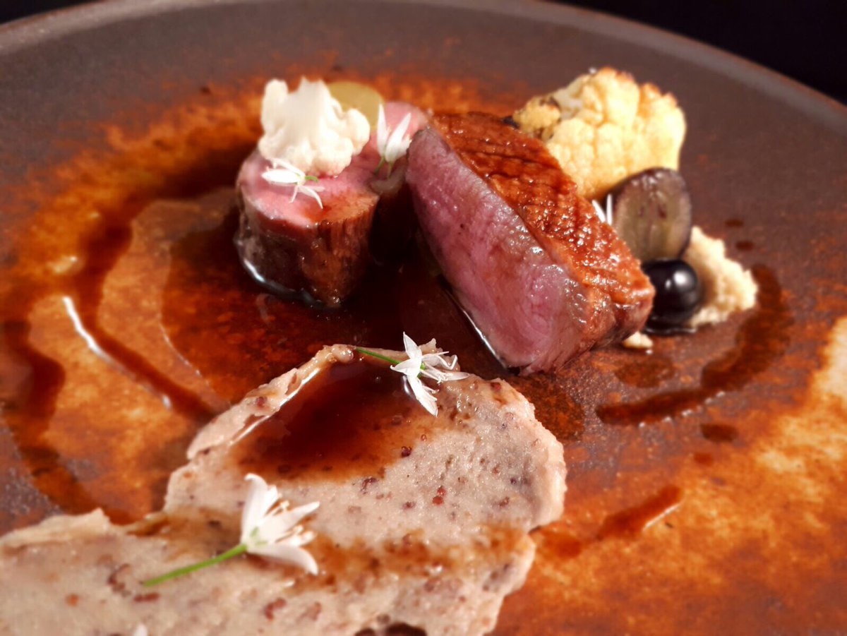PaulJ_AP's tweet photo. The main event! Stone bass and duck #dineSW9 @PaulJ_AP @ALISON_PRICE https://t.co/CQEu4UmLbp