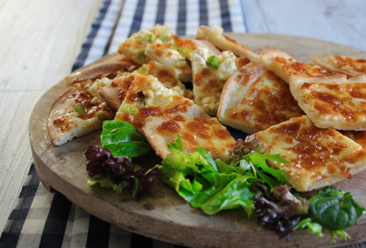 Over garlic bread? Why not try our garlic, spring onion and feta cheese squares!