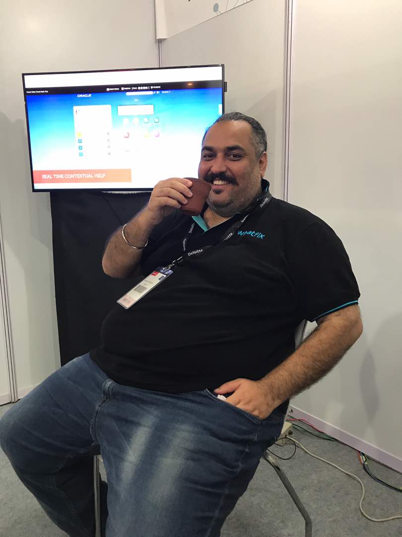 whatfix's tweet photo. The Smile of #saTEAsfaction at #oowIndia. That's our @lordyurie chilling there with a hot cup of Tea! Drop in by #Booth308 for a quick chat! https://t.co/b6PMpvU7pt