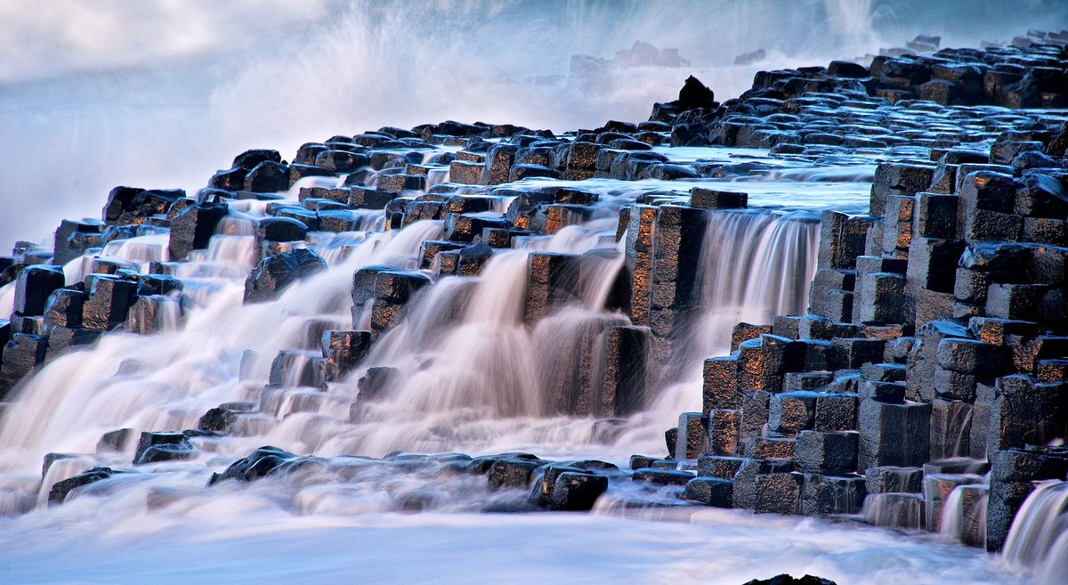 LocalizedLife's tweet photo. Walk over the aftermath of an #ancient volcanic eruption at Giant's Causeway in Northern #Ireland. https://t.co/LubbKnQHri https://t.co/8YYFhxyd1G