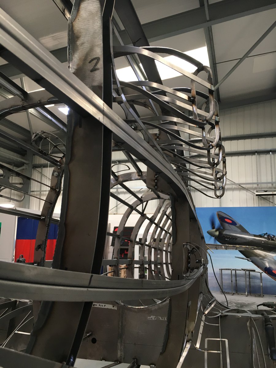 KMFmetal's tweet photo. KMF Apprentices are working hard with Suhail this week to add the final details to our #spitfire sculpture @sot2021 @SentinelStaffs https://t.co/TmW0p38OH6