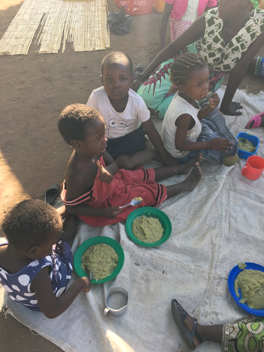 jteaguejacobs's tweet photo. This girl in #Malawi is enjoying her nutritious sweet potato porridge! #UBALE project w/ #CADECOM @CatholicRelief @USAIDFFP #thumbsup https://t.co/iAeLbrUbB9
