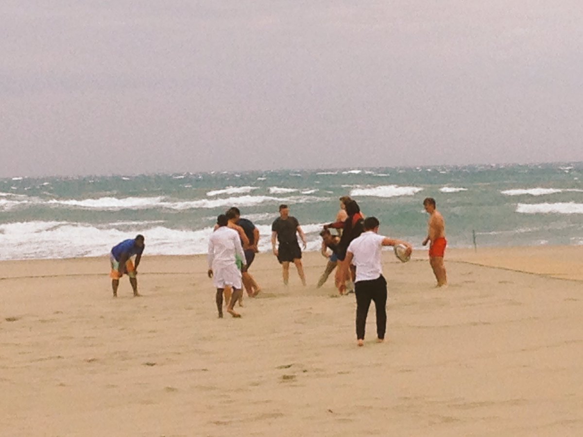 BDCRugby's tweet photo. BDC Rugby Academy whilst in Perpingnon visit a blustery Canet beach for some touch rugby @BDC50years https://t.co/U1sMHUHB1g