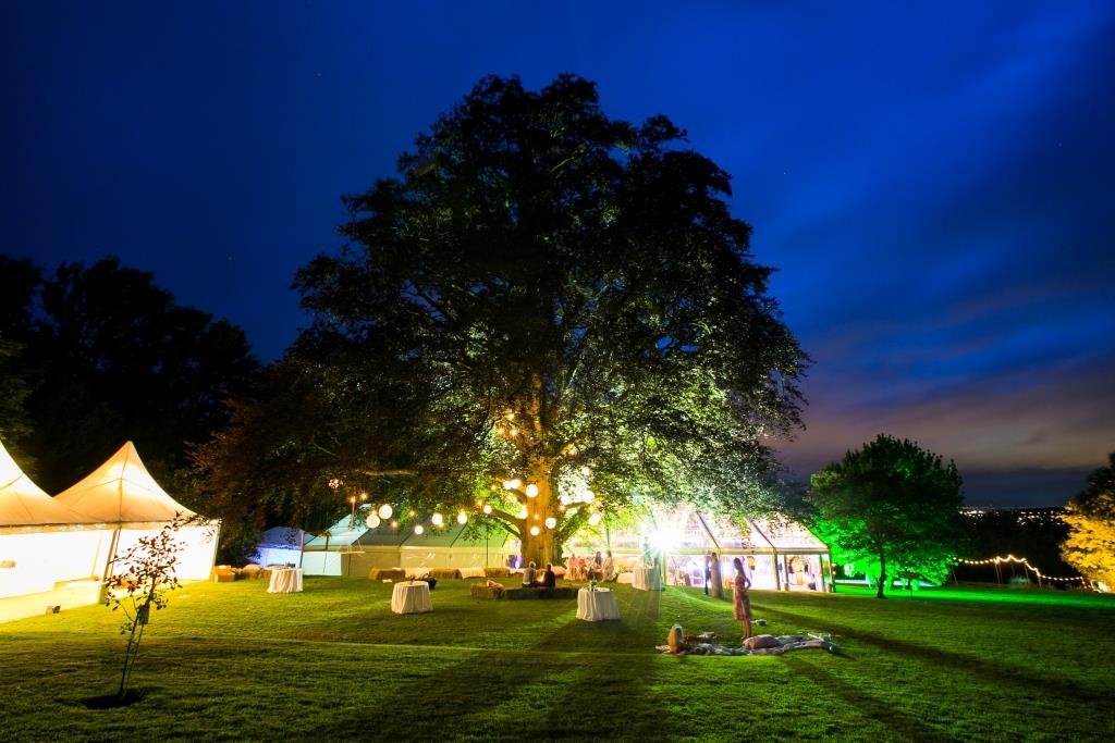 A dazzling marquee with glowing uplighters to making the outside look equally as fabulous as the inside #weddingwednesday #marqueehour #love