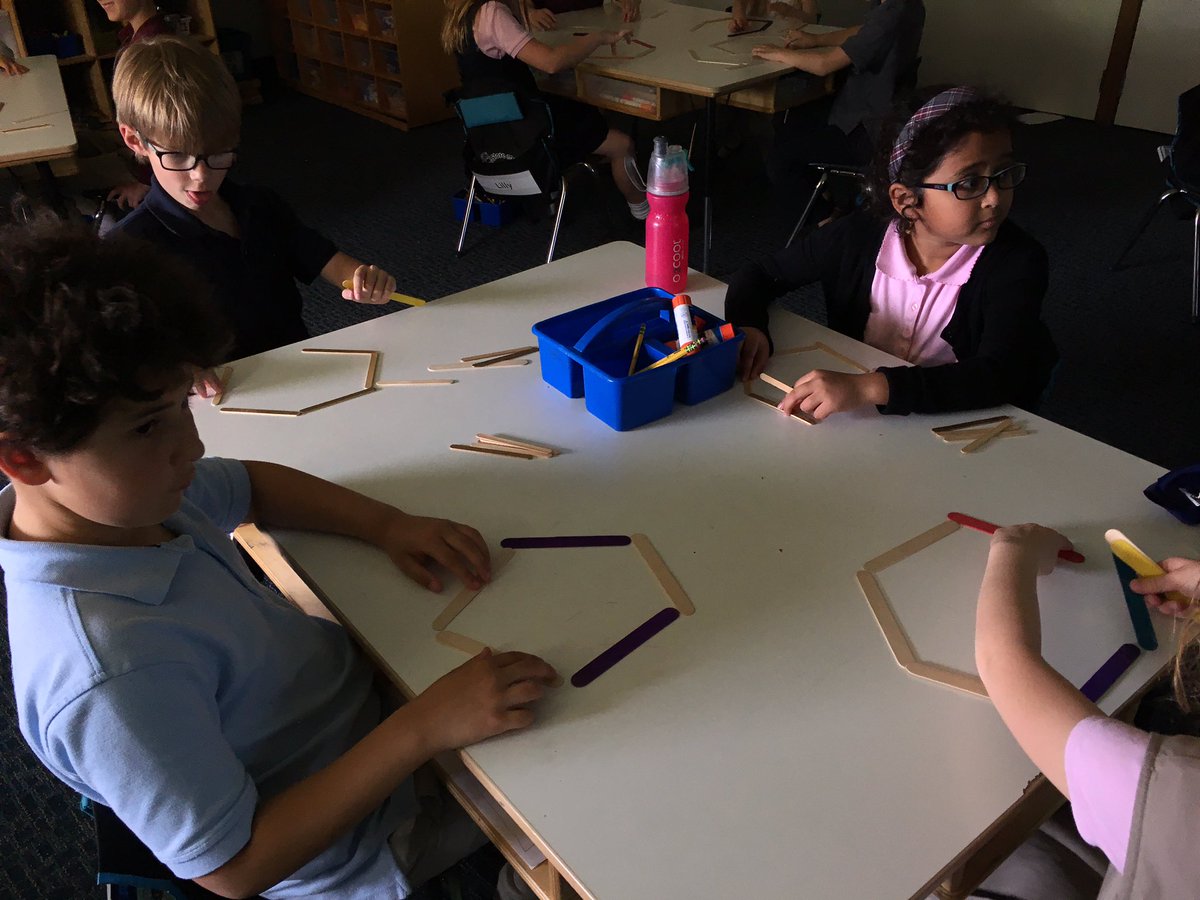 CAFirstGrade's tweet photo. Listening to the Polygon Song and making polygons out of craft sticks. https://t.co/hQgkCBo08N