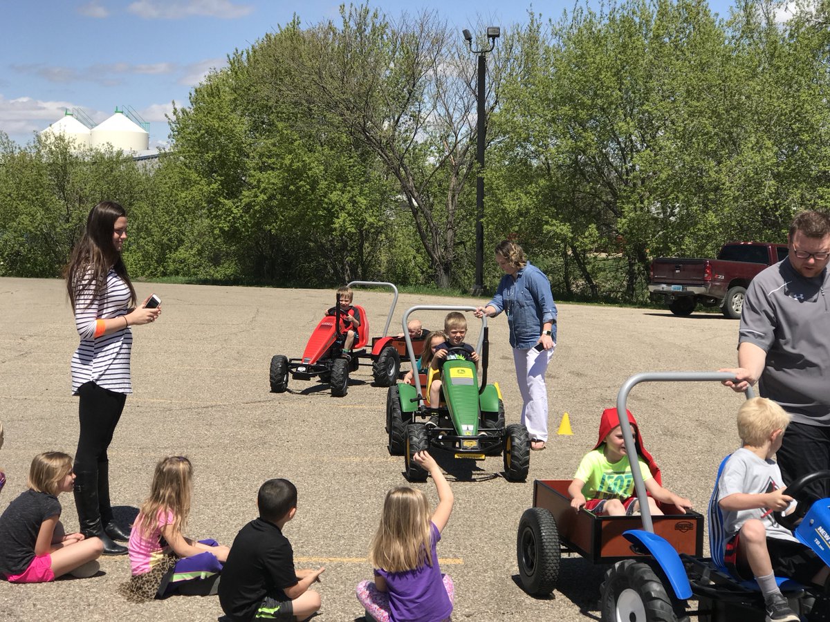 A class of kindergartners stopped by the NDFU office today. They rode the NDFU tractors. I was able to catch a ride from a great little girl