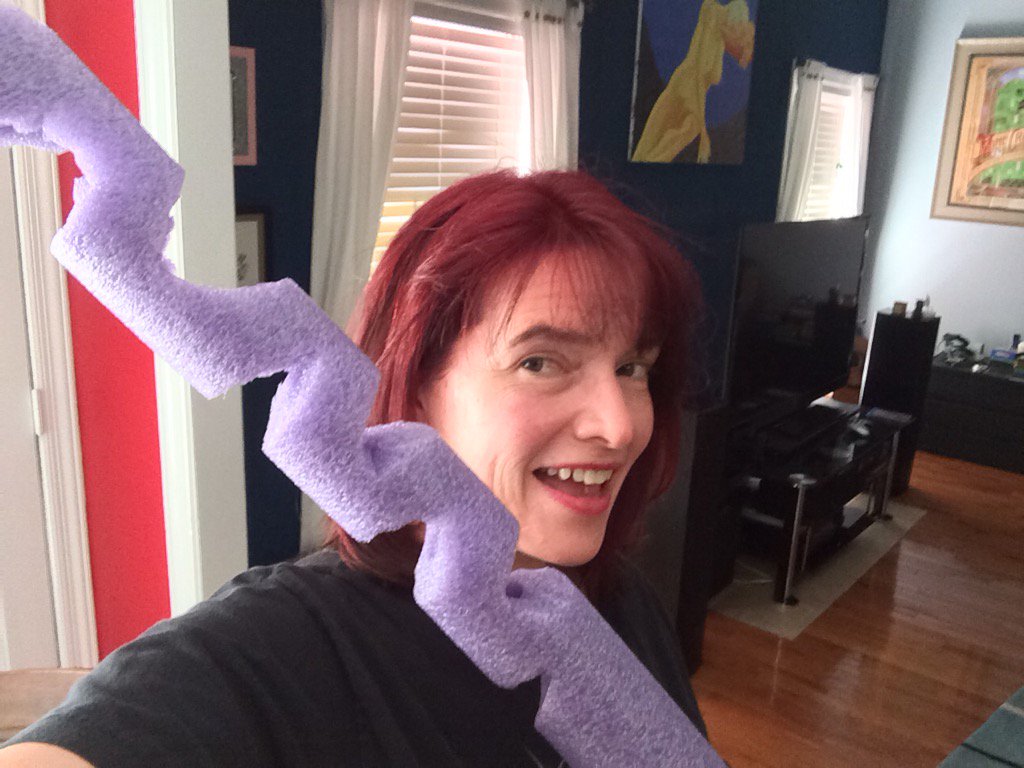 Working on a purple pool noodle tentacle. First attempt. Don't judge. Lol