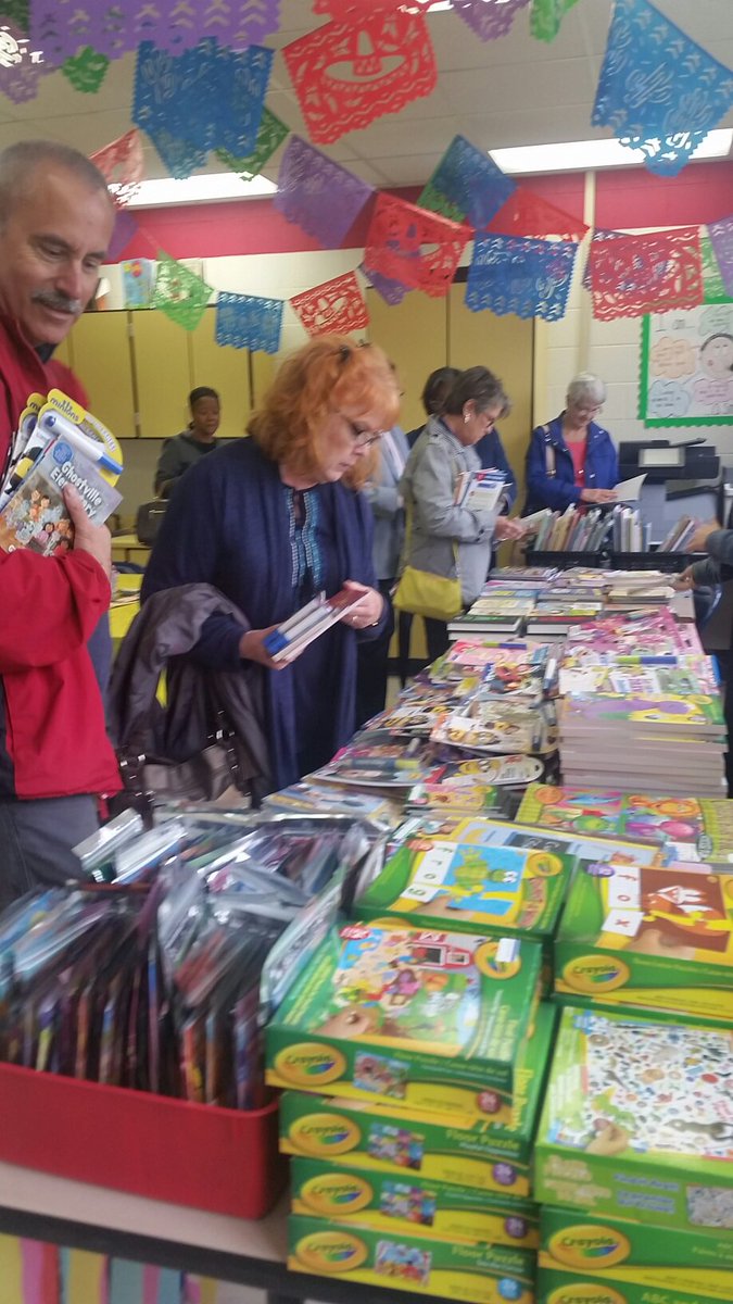 Reading Clinic tutors were so excited to pick out books from <a href="/BookemNash/">Book'em</a>. Their students were even more excited to receive them!