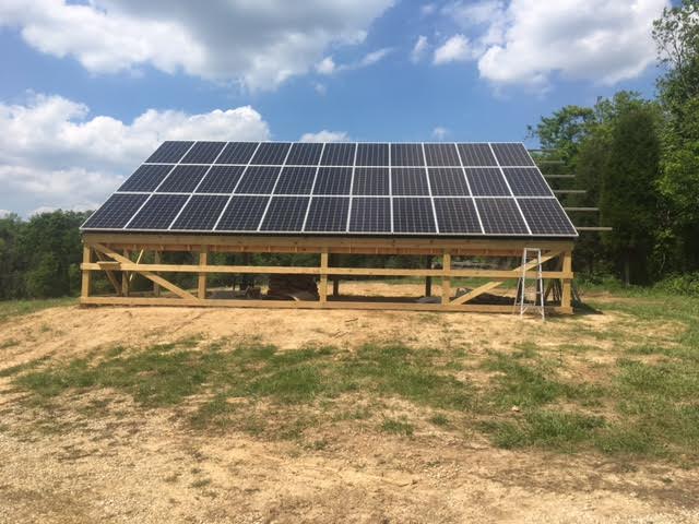 unboundsolar's tweet photo. Check out this sweet #DIY #CustomerInstallation! Pole barn racking system, 10kW array with a SolarEdge inverter and Suniva 340 watt panels. https://t.co/2GJEK7hu1M