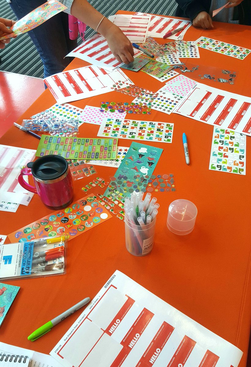 SciCommSocLDN's tweet photo. Registration has only just opened and already there is a sticker-based frenzy at the name badge table... #LSCS17 https://t.co/Acs6JsA8bw