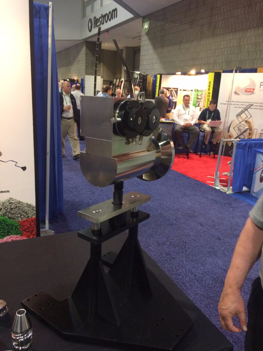 guilltool's tweet photo. Our dual output #crosshead coats 2 #wires at once! Can your #extrusion #tooling do that? Come see us at #Interwire17 Booth #705 today! https://t.co/ObxoBah9YV