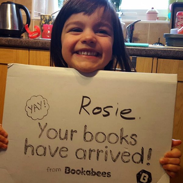 #Tbt to Rosie Loving her first #Bookabees Delivery! Take a peek at what was inside, on our brand spanking new homepage! #bookworm #Kids