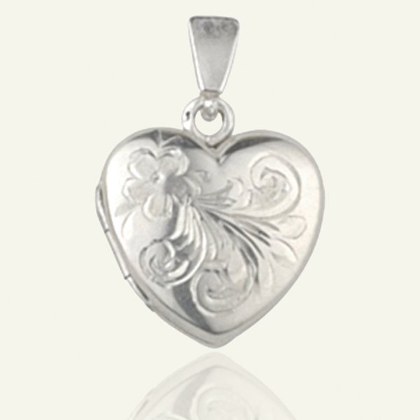A sterling silver petite heart-shaped locket hand engraved with a delicate floral motif. thelockettree.co.uk/products/hand-…
#Silver #locket #jewellery