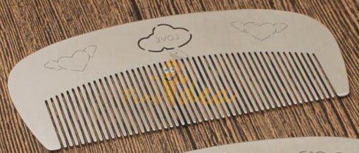 stainless steel beard comb. well crafted.