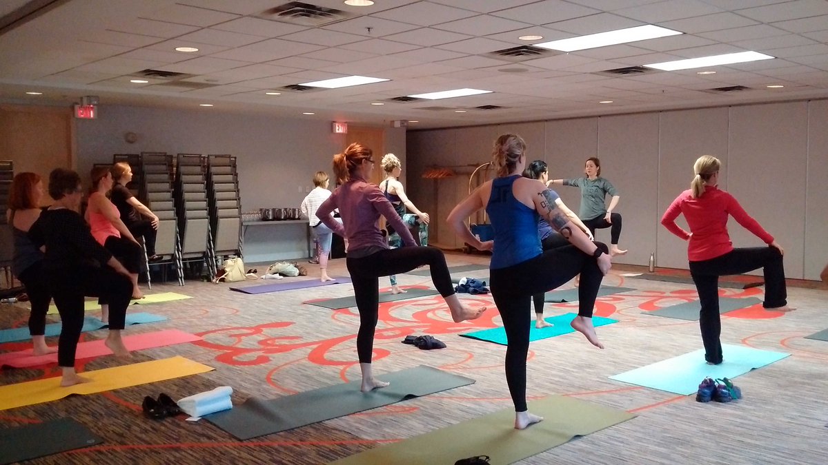 A peak at this morning's short yoga session as part of the #NB Wellness Conference. Kudos to these early birds! :P