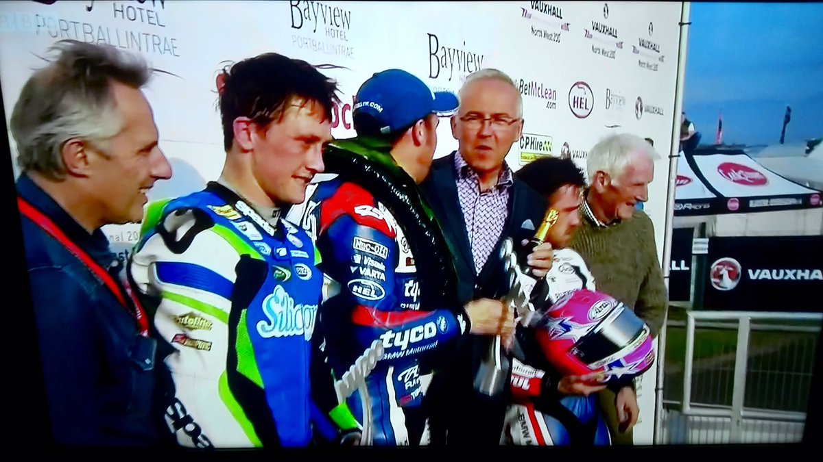 4thxjuly's tweet photo. @Stavros6 @PhillipMcCallen @pitlanescoop @winkerwatson1 Mein Host @BayviewHotelni Portballintrae #BBCNW200 on the podium with #WeeWizard ๐๐ https://t.co/wXbINnJ6xj