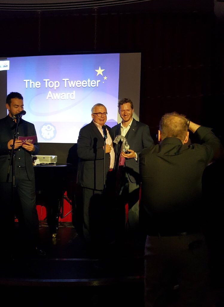 .@thebenforster hosting #a4opresidentialawards today. #ChristopherBiggins presents @MichaelWharley w. the #TopTweeterAward Pic @minnieayres