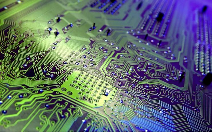 Computer is made of electronic components. Вакуумная наноэлектроника. Дорожки платы. Печатная плата. Плата микросхема.