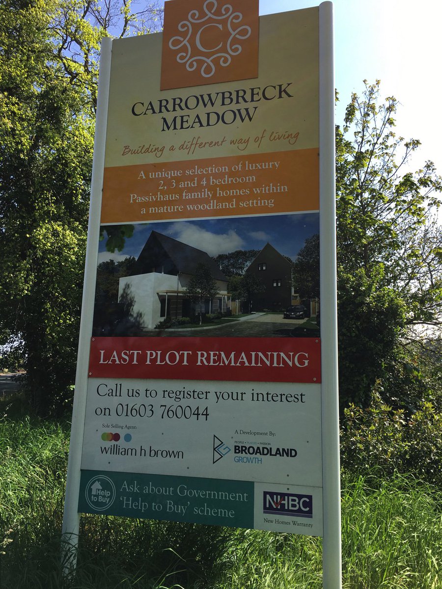 Check signboard! A development by <a href="/BroadlandDC/">Broadland District Council</a> in leafy Norwich fringe. What a turn up! NIMBYism quaking in boots?