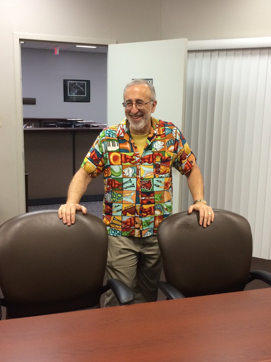 LouisianaWorks's tweet photo. Executive Counsel Rob Roux relaxes in his best Hawaiian Free Day Friday gear. #IServeLouisiana #LWC4LA #LWC #StateCivilService #LaWorks https://t.co/A5bJvJfMPK