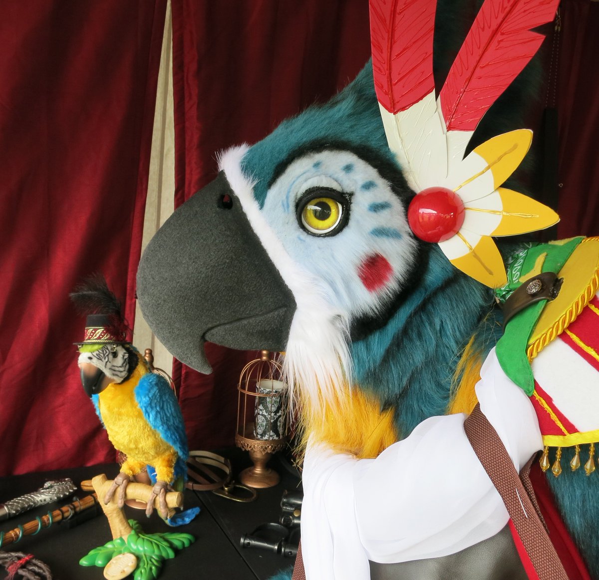 TheBeastcub's tweet photo. I found a fellow parrot at the adventure fair, enjoy this pic of a pair of fancy birbs https://t.co/tNIrFPEM78