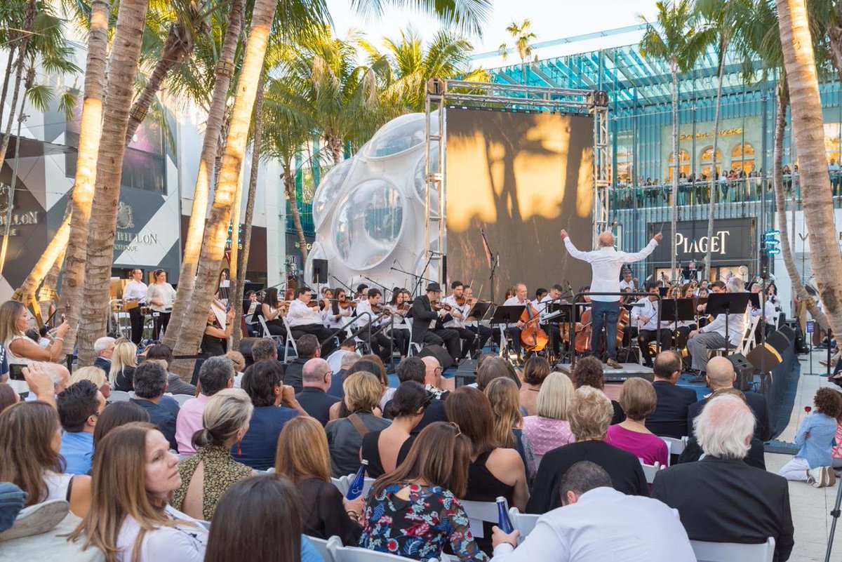 Miamimagazine's tweet photo. Join the @MiamiSymphony  &amp; the @designdistrict  for their FREE pop-up concert in the #PalmCourt starting at 5pm! https://t.co/VVDyosWkBK https://t.co/91EPXJk1ik