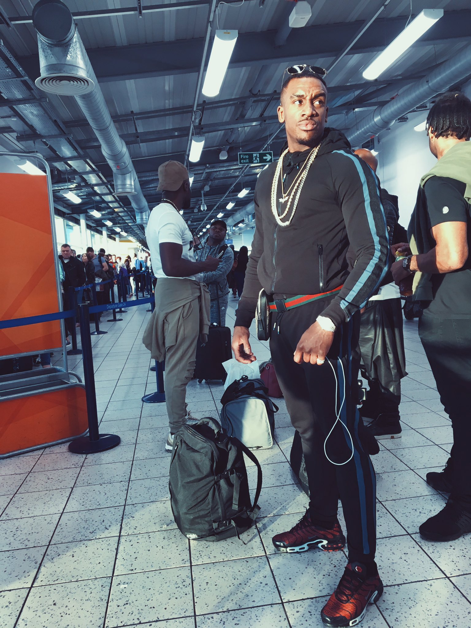 Bugzy Malone on X Batman pendant with the Spiderman Nikes. https t qxYtPVIPZX X