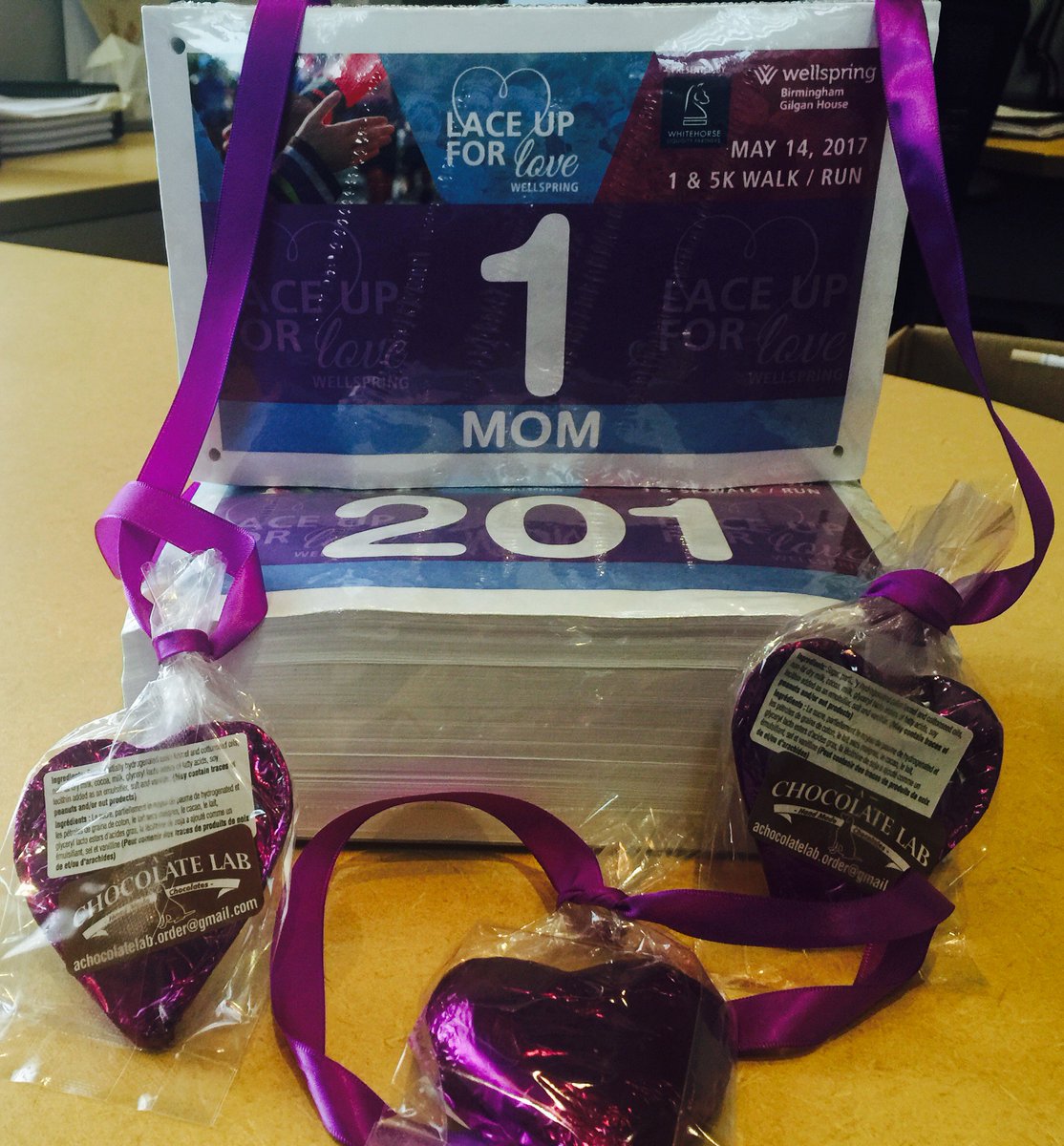 WellspringGTA's tweet image. Thanks to  @BibNumbers &amp;amp;  #AChocolateLabHandmadeChocolates the #LaceUpForLove bibs and chocolate medals look great!