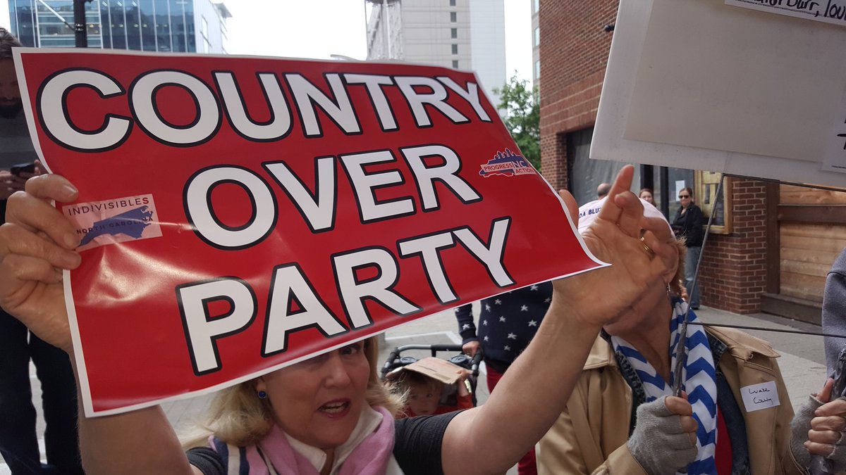 ProgressNow_NC's tweet photo. Indivisibles descend on conservative foreign policy conference to tell #NCGOP Congressmen to put country over party #ncpol #IndivisibleNC https://t.co/JYgcMXejm5