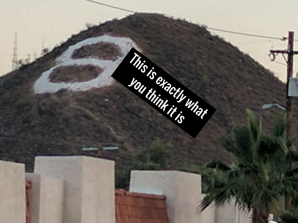 Vandals worked long & hard to erect a NSFW makeover on Sunnyslope