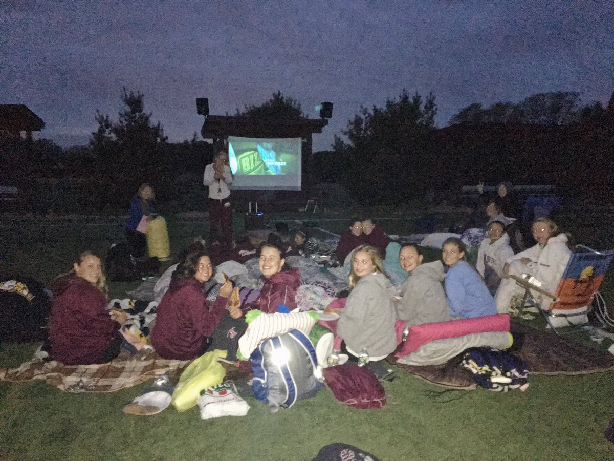Team movie night on the turf 🍿🍕