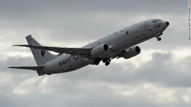 CNN's tweet photo. A Russian military jet "came within approximately 20 feet" of a US Navy surveillance plane earlier this week https://t.co/Yoc9Xz52Yp https://t.co/0ezmR3GKZG