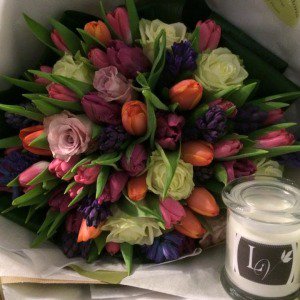 A bouquet and one of our handmade exclusive candles, perfect gift for any occasion. #Alderleyedge #Wilmslow