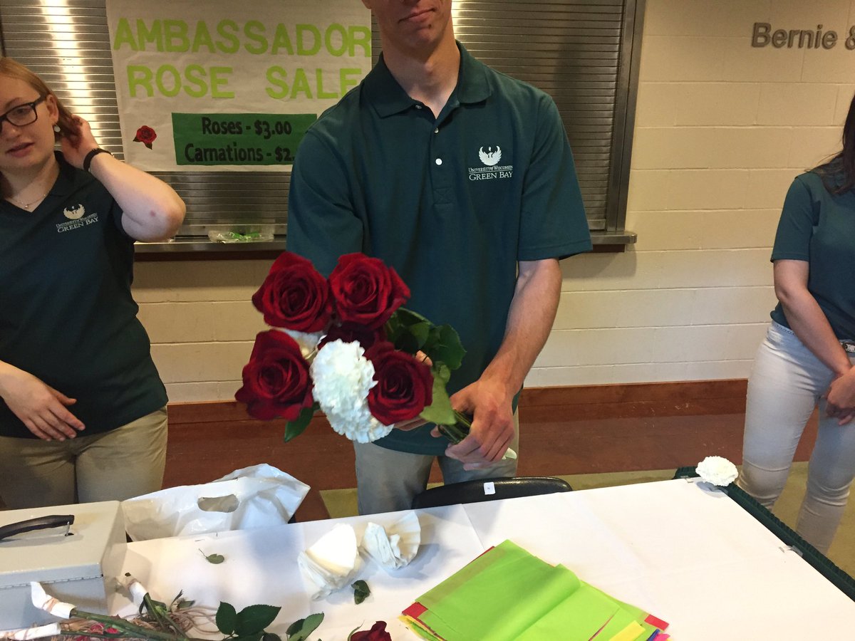 uwgb's tweet photo. Forget to pick up flowers for your #gbgrad? @UWGB_ATEAM has you covered! 🌹 https://t.co/mVnCVt5eLz