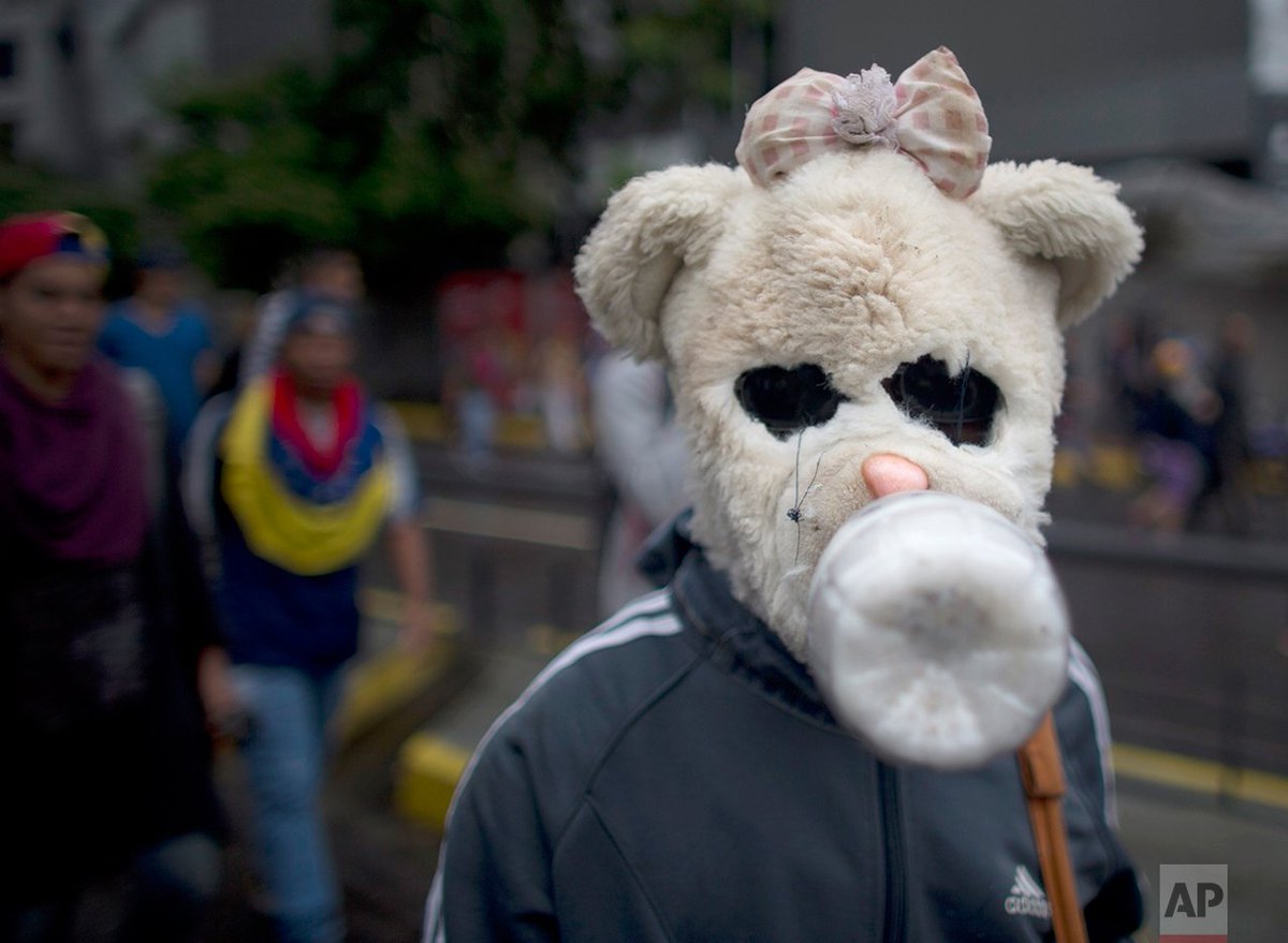 AP_Images's tweet photo. Innovative protesters in #Venezuela are using makeshift weaponry &amp; protective gear. https://t.co/708CSfcDmc @JFernandoLlano @CubillosAriana https://t.co/smjQWlpReY