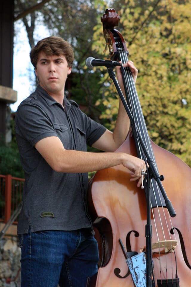 TheBrosStrong's tweet photo. Lock-Step Ian wields the great responsibility of playing the upright bass. It is a great responsibility because it is so heavy and awkward. https://t.co/qg38Fx5Vp1