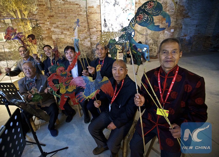 Artists interpret Chinese artistic tradition with shadow puppet &amp; embroidery at #VeniceBiennale2017, Italy