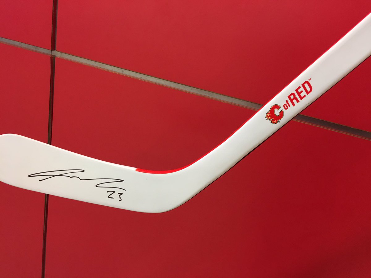MomCEOCanada's tweet photo. Pretty excited about my @NHLFlames stick signed by @Monahan20. Thx for donating to the Central AB Brain Injury Society's silent auction!! https://t.co/gaDNP1UTwD
