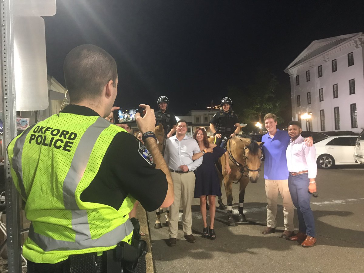 OxfordPolice's tweet photo. A picture of taking a picture with @OxfordMounted . #SquareThings #GraduationWeekend https://t.co/TVKzfmKylv