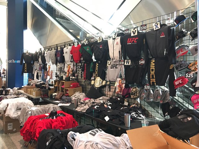 Arash Markazi on X: The UFC merchandise stand at UFC 211 where you can get  everything from a program for $20 to a UFC belt for $500.   / X