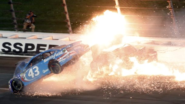 NASCARonNBC's tweet image. #NASCAR: Aric Almirola airlifted for observation after crash at KansasSpeedway. He is awake and alert. tw.nbcsports.com/yW12