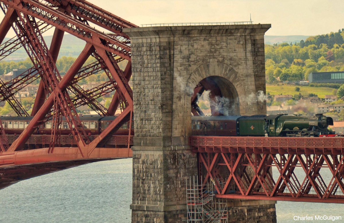 BeingScots's tweet photo. Such an incredible pic of two engineering icons, shot by @CharlesMcGuiga2 an hour ago. Thank you. #FlyingScotsman #ForthBridge https://t.co/tIb8sNDCB7