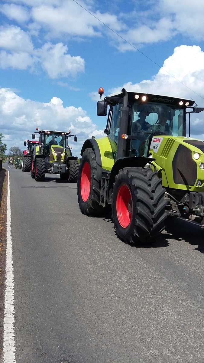 On my way to Deeping when I must of passed 30 tractors, great site .