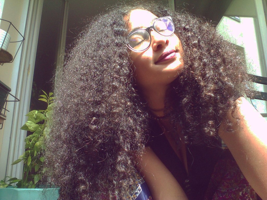 sapphxgemini's tweet photo. Hi it's your fav non-binary chillin' on the balcony 🌞

#nonbinaryPOCtwitter https://t.co/5DPJt97gHt
