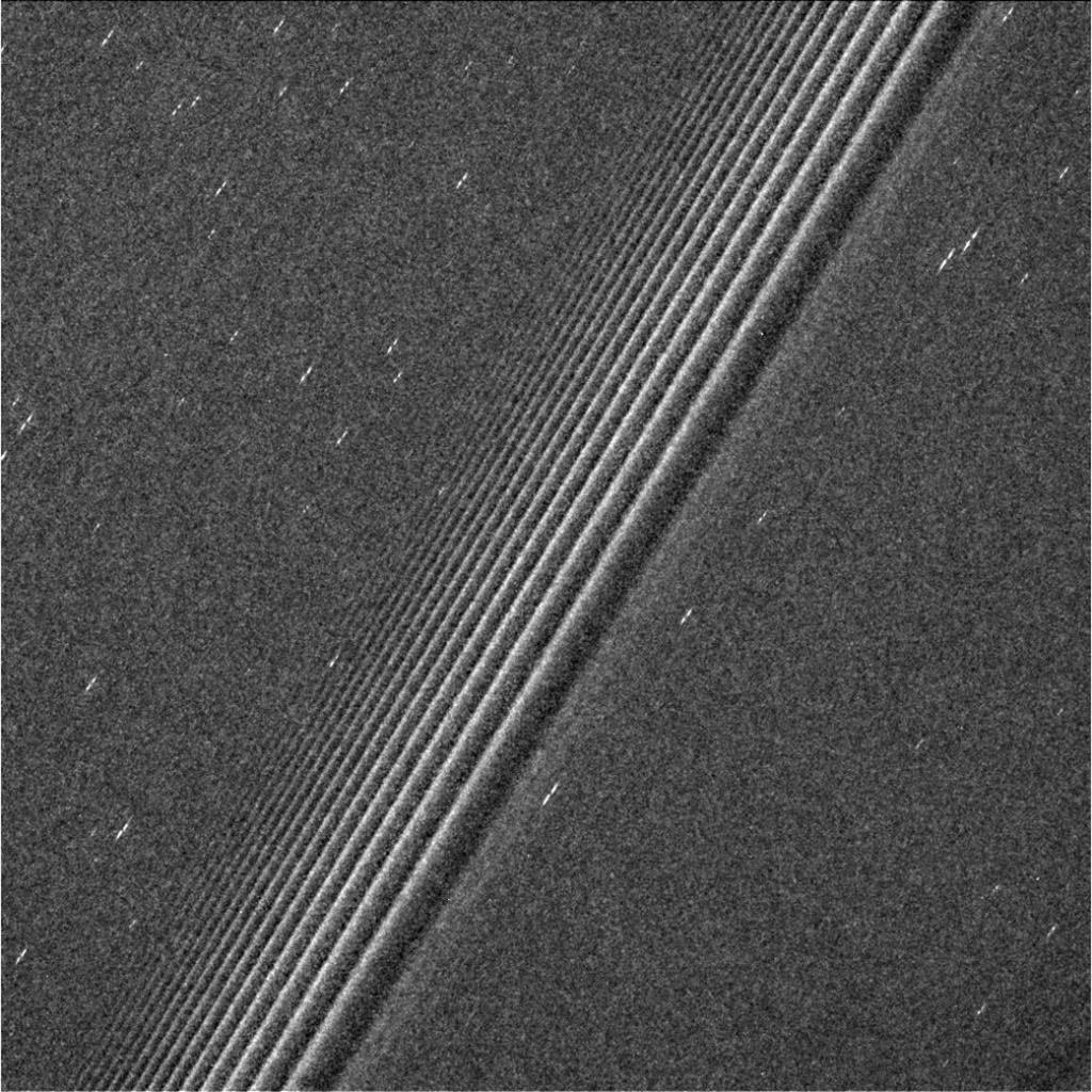 NASA's tweet image. Features called propellers – small, bright shapes in Saturn’s A ring – are seen here in the sharpest view ever taken go.nasa.gov/2rfUnAP