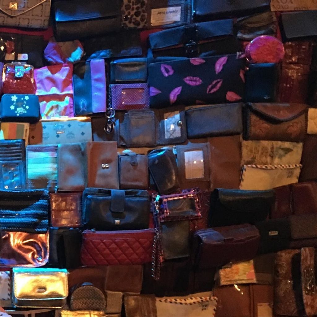 CKRapp's tweet photo. Wall o' wallets, as seen at Relix. #fmsphotoaday #fms_wall https://t.co/erjzHvhWnE https://t.co/dsvJ9QUhr2