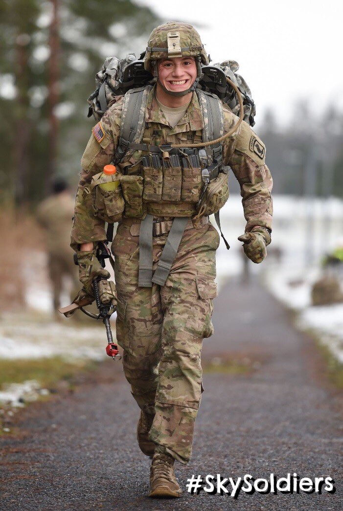 173rdAbnBde's tweet photo. Spc. Leroy Chapman, a 2-503d paratrooper smiles as he reaches the finish line during a 12 mi. ruck march for his EIB https://t.co/AfO4k4udex