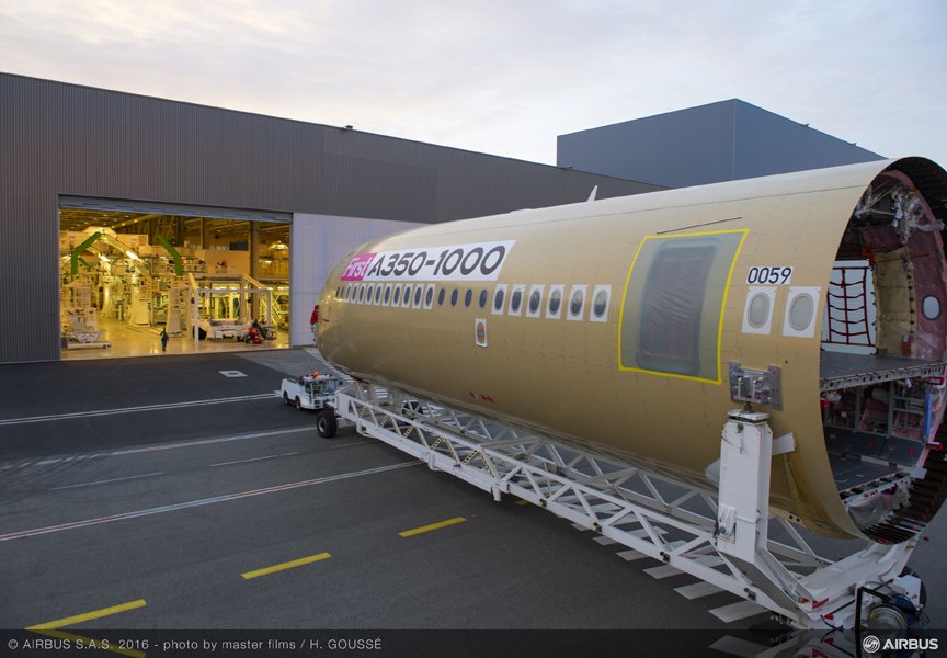 Airbus's tweet photo. Final assembly of the first #A350-1000 is underway on time, in Toulouse, France https://t.co/UrLBSTNs1k https://t.co/L4QX1Lr0bP